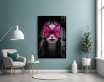Butterfly Eyes glass wall art styled above a console in a hallway