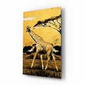 Giraffe glass wall art displayed above a linen sofa in a warm safari lounge with rattan armchair and brass picture light
