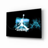 Michael Jordan glass wall art displayed above a black leather sectional in a moody man cave with neon LED strip and matte-black coffee table
