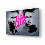 Fight Club Poster glass wall art displayed above a black leather sectional in a moody man cave with brass arc lamp and reclaimed-wood console