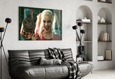 Harley Quinn glass wall art styled above a console in a hallway