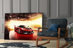 Ferrari FXX K glass print enhancing a study with cinematic warmth