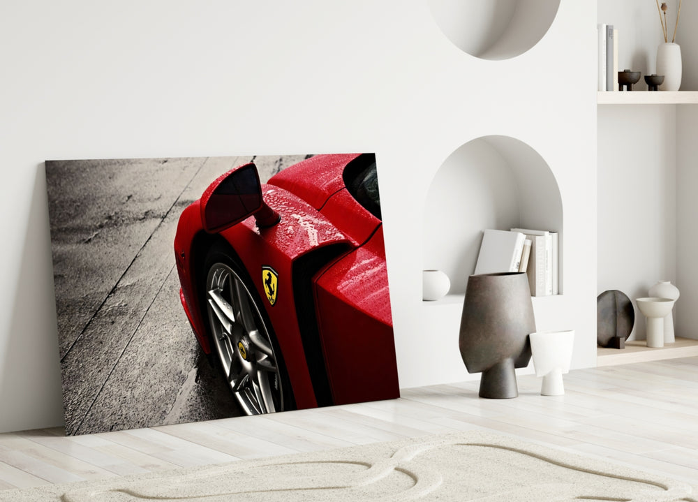 Ferrari FXX K close-up showing rain-spattered crimson hood with prancing horse shield