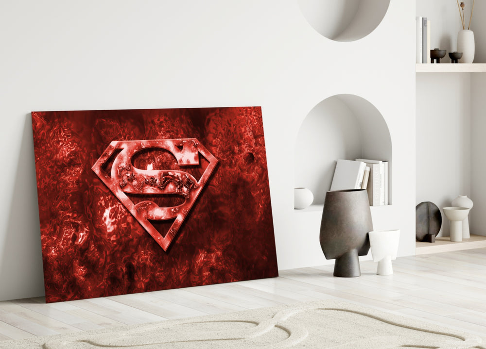 Superman close-up showing crimson shield logo in liquid metal field