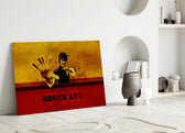 Bruce Lee close-up showing forward fighting stance on sun-burst gold field