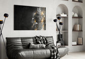 Christiano Ronaldo glass wall art styled above a desk in a teen lounge