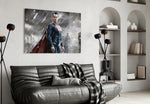 Superman glass wall art styled above a desk in a kids room