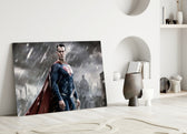 Superman close-up showing scarlet cape and crimson crest in slate rain
