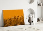 Wanderlust close-up showing flowing cursive across marigold-tinted NYC skyline