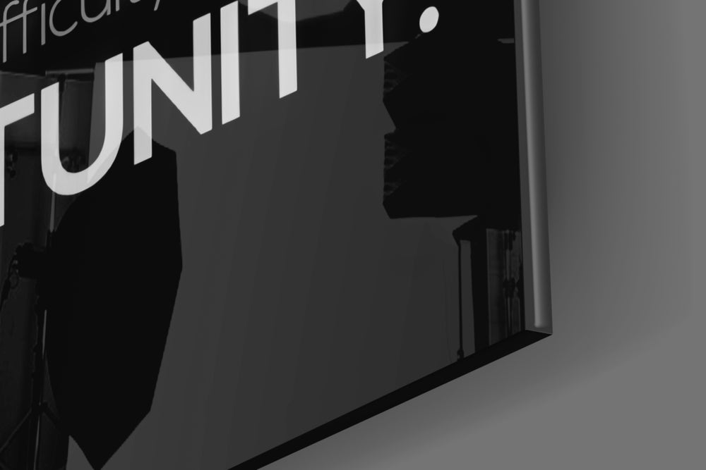 Einstein artwork anchoring a wall with moody motivational palette