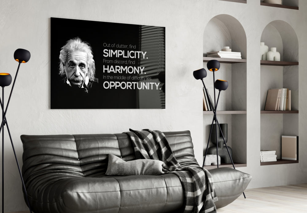 Einstein glass wall art styled above a desk in a study