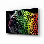 Leopard glass wall art displayed above a black leather sectional in a moody gaming room with neon LED strip and matte-black console