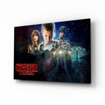 Stranger Things Poster glass wall art displayed above a velvet sofa in a moody teen lounge with neon LED strip and matte-black coffee table