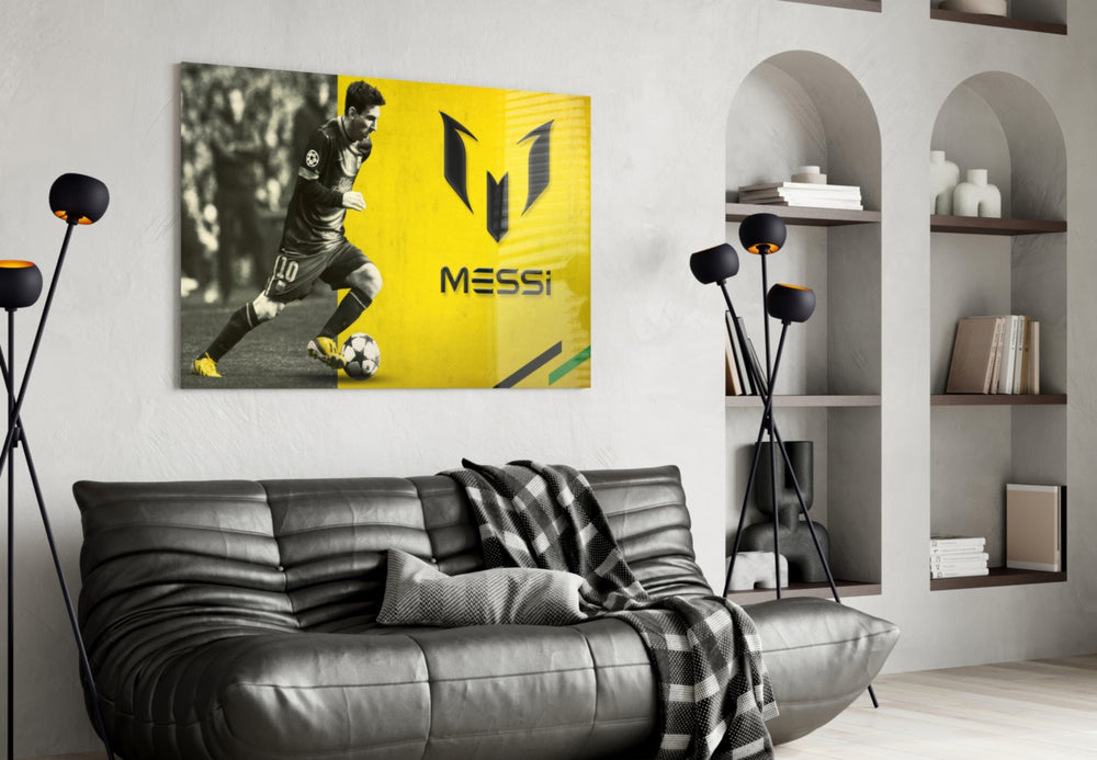 Messi glass wall art styled above a desk in a teen lounge