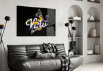 Los Angeles Lakers glass wall art styled above a desk in a teen lounge