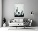 Old City Silhouette glass wall art styled above a desk in an office