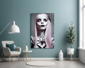 The Puppet glass wall art styled above a console in a hallway