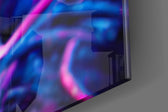 The Native artwork anchoring a wall with bold vibrant palette