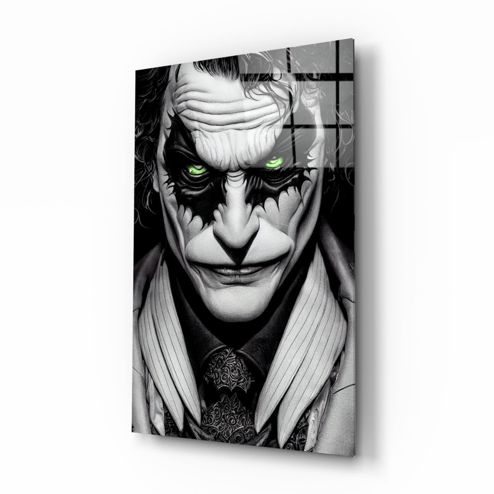 Joker glass wall art displayed above a black leather sectional in a moody home theater with blackout drapes