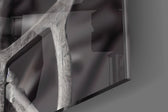 Future Human artwork anchoring a wall with bold monochrome palette