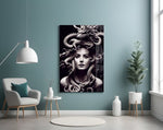 Medusa glass wall art styled above a sideboard in a man cave