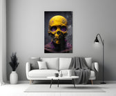 Skull close-up showing gold leaf cranium and violet-stained sockets