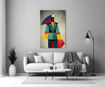 Colored Man close-up showing geometric mannequin in cyan robe with mustard panels