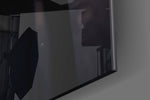 Black Rage artwork anchoring a wall with bold dramatic palette