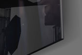 Black Rage artwork anchoring a wall with bold dramatic palette