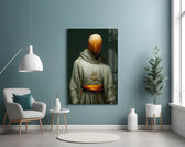 Headless Monk glass wall art styled above a sideboard in a living room