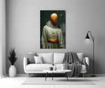 Headless Monk close-up showing smooth amber face above silver linen robe