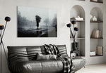 Loneliness glass wall art styled above a desk in a study