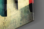 Language artwork anchoring a wall with bold modern palette