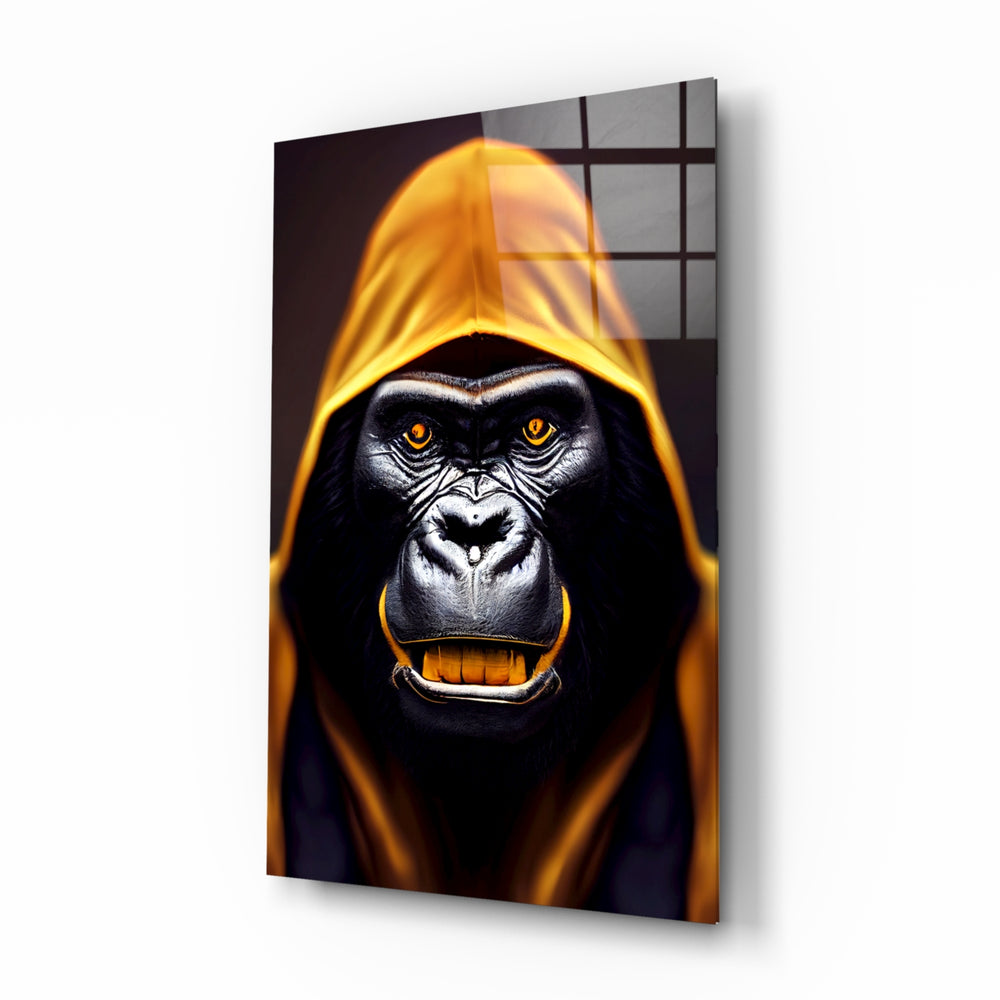 Angry Smile glass wall art displayed above a black leather sectional in a moody man cave with brass sconces
