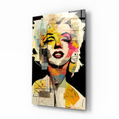 Marilyn Monroe glass wall art displayed above a black leather sectional in a moody home theater with blackout drapes