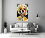 Marilyn Monroe close-up showing golden curls and crimson lips on black ground
