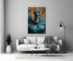 Bloody Batman close-up showing blue cowl and white-glowing eyes amid orange flame