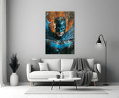 Bloody Batman close-up showing blue cowl and white-glowing eyes amid orange flame