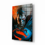 Bloody Superman glass wall art displayed above a black leather sectional in a moody home theater with blackout drapes