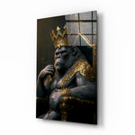Ape King in Throne glass wall art displayed above a walnut console in a moody hallway with brass sconces