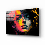 Rebel Beauty glass wall art displayed above a desk in a moody teen lounge with magenta and saffron LED accents