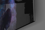 Space Dog artwork anchoring a wall with bold dramatic palette