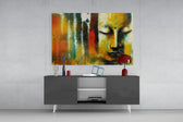 Buddha panel catching window light to reveal its meditative warmth