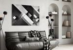 Cubic glass wall art styled above a console in a hallway