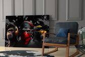 3 Wise Monkeys glass print enhancing a teen lounge with cinematic mood