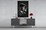 Thomas Shelby panel catching window light to reveal its cold-steel gravity