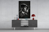 Thomas Shelby panel catching window light to reveal its cold-steel gravity