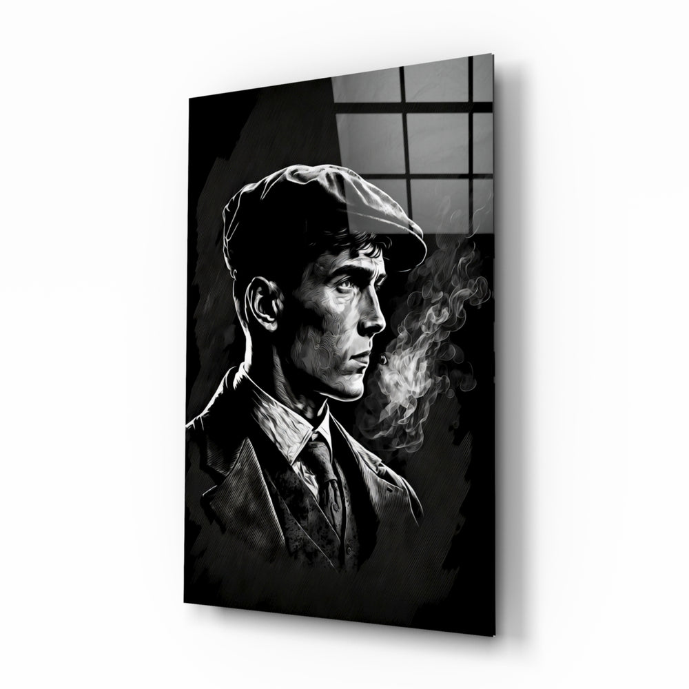 Thomas Shelby glass wall art displayed above a walnut desk in a moody home office with brass sconces
