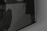 Thomas Shelby artwork anchoring a wall with dark refined palette