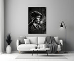 Thomas Shelby close-up showing newsboy cap silhouette with curling smoke